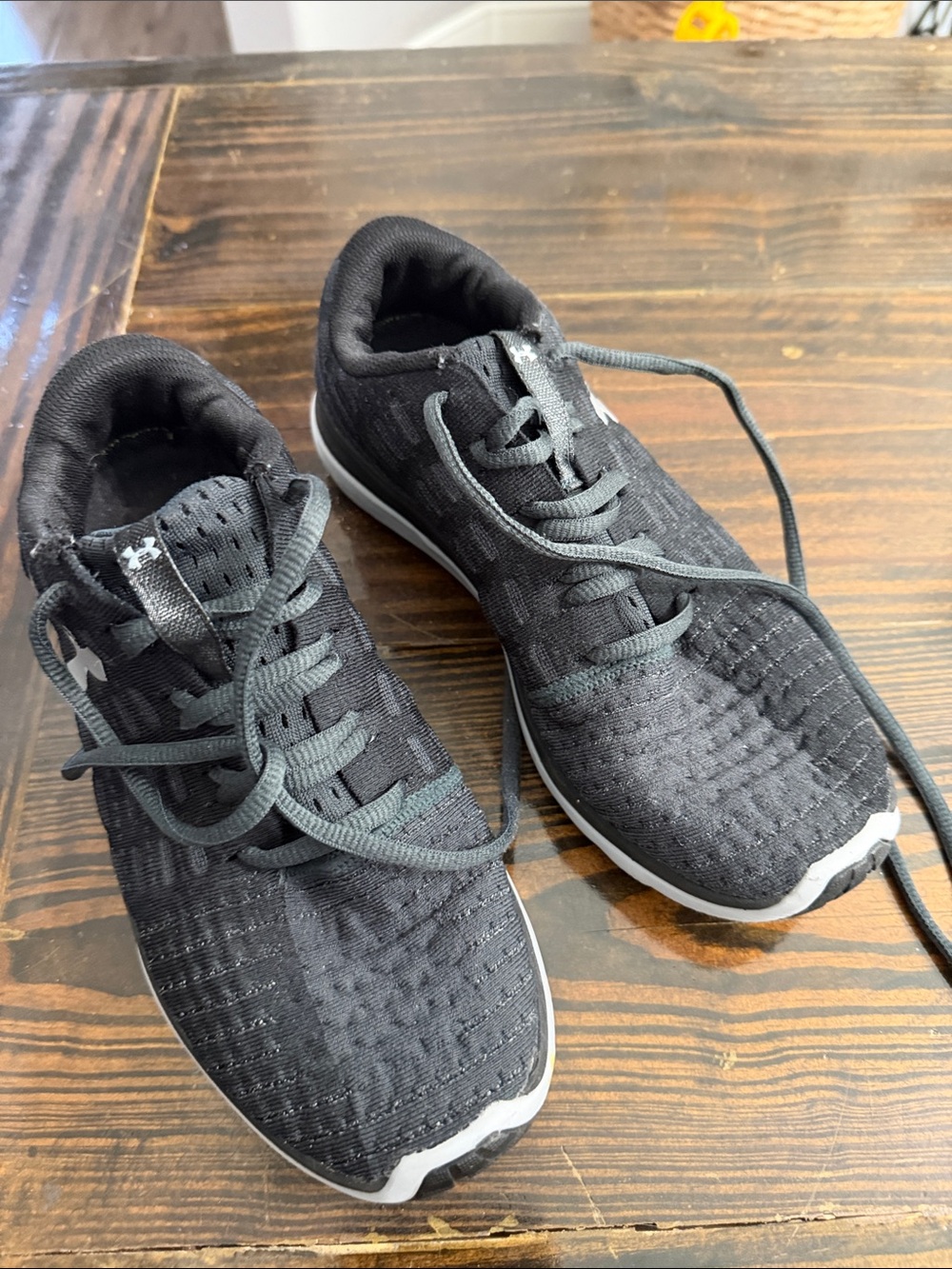 Under Armour women's Black Athletic Lace-Up Running Shoes